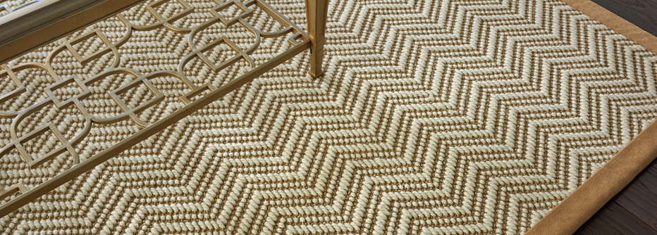 Beige patterned area rug in living room 